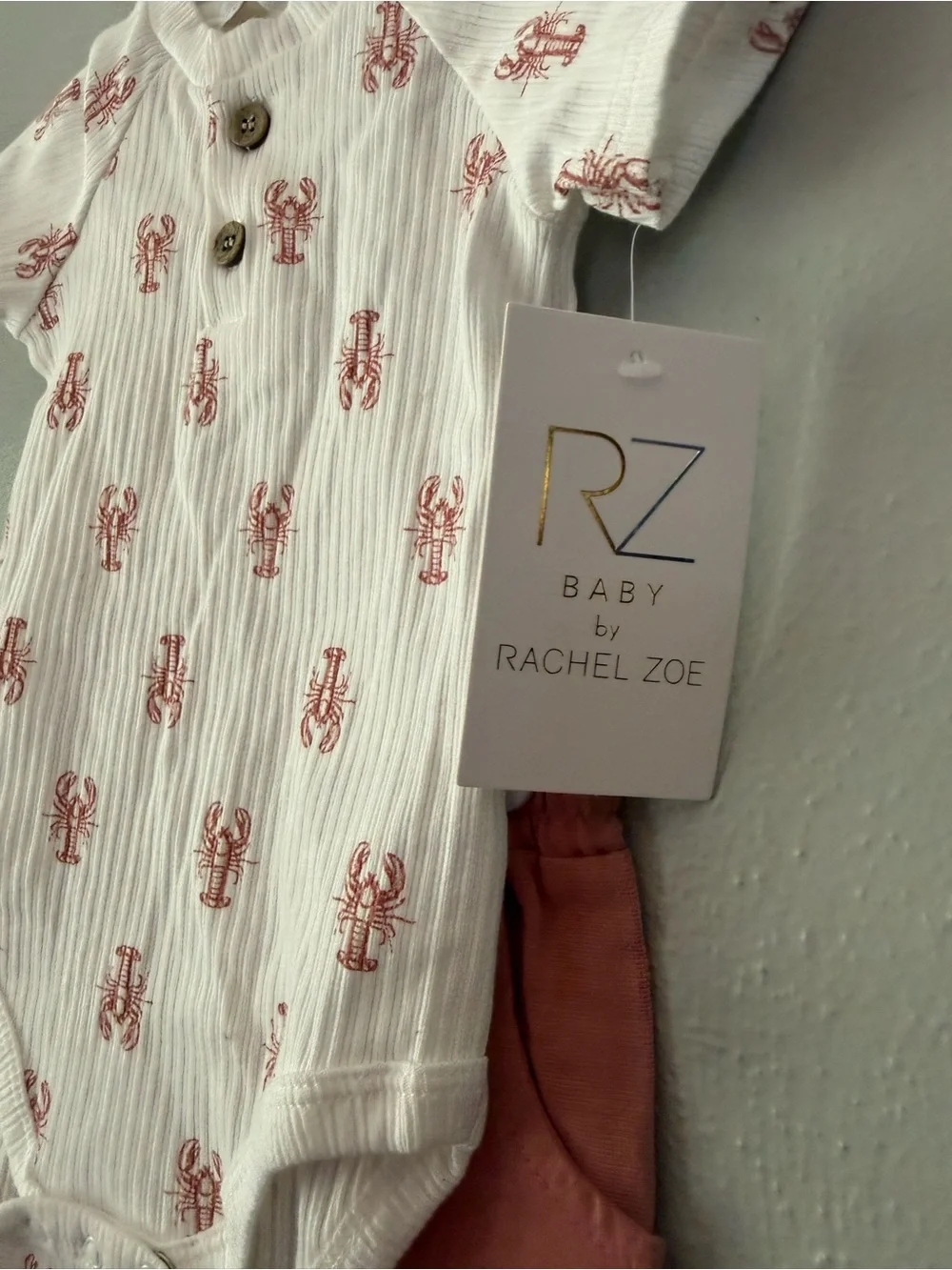 Rachel Zoe Baby Cream Onesie with Rust Lobster Print